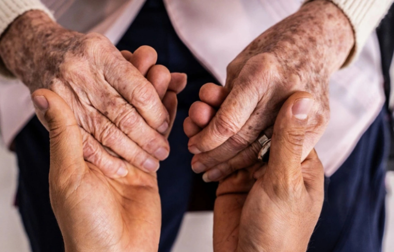 Family discussing senior living with an aging parent